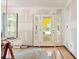 Light-filled open room with hardwood floors and white walls featuring front yard views at 2654 Harvey Ave, North Charleston, SC 29405
