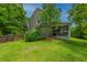 Inviting backyard with a screened-in porch, perfect for outdoor living and entertaining at 3025 Buckeley Cir, Charleston, SC 29414