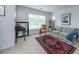 Bright bedroom with a rocking chair, a comfortable couch, and an oriental rug at 3025 Buckeley Cir, Charleston, SC 29414