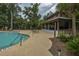 Relaxing community pool area with lounge chairs and covered pavilion for residents enjoyment at 3025 Buckeley Cir, Charleston, SC 29414