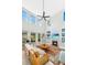 Bright, airy living room with tall ceilings, fireplace, large windows and comfortable seating at 3025 Buckeley Cir, Charleston, SC 29414