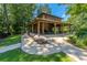 Outdoor pavilion with fireplace and picnic tables offers residents a gathering place amidst green spaces at 3025 Buckeley Cir, Charleston, SC 29414
