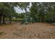 Enjoyable community playground surrounded by mature trees and natural landscaping at 3025 Buckeley Cir, Charleston, SC 29414