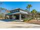 Pool house with seating and shade, ideal for gatherings and poolside relaxation at 3025 Buckeley Cir, Charleston, SC 29414