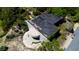 Aerial view of a concrete building surrounded by trees at 3030 Brownell, Sullivans Island, SC 29482