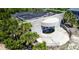 Aerial view of a unique building with concrete and lush greenery at 3030 Brownell, Sullivans Island, SC 29482