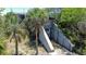 Exterior entrance featuring a concrete design with palm trees at 3030 Brownell, Sullivans Island, SC 29482