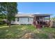 Well-maintained backyard with a screened porch, offering a serene outdoor living space at 3050 Brigham Ct, North Charleston, SC 29406