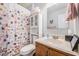 Clean bathroom with shower curtain, tiled floor, and a wooden cabinet at 3050 Brigham Ct, North Charleston, SC 29406