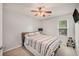 Neutral bedroom with natural light, ceiling fan, and hardwood flooring at 3050 Brigham Ct, North Charleston, SC 29406