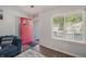 Inviting entryway featuring a bright, colorful door and views to the front yard at 3050 Brigham Ct, North Charleston, SC 29406