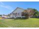 Charming single-story home featuring a cozy front porch, attached garage, and well-maintained lawn at 3050 Brigham Ct, North Charleston, SC 29406