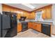 Well lit kitchen with wooden cabinets, stainless steel appliances, and granite countertops at 3050 Brigham Ct, North Charleston, SC 29406