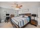 Bright main bedroom with ceiling fan, natural light, and neutral color scheme at 3050 Brigham Ct, North Charleston, SC 29406