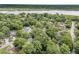 A beautiful aerial view of a lush, wooded neighborhood with waterfront access, perfect for nature lovers at 31 Monte Sano Dr, Hanahan, SC 29410