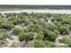 A scenic aerial shot of a tree-lined neighborhood, close to a lake, and easy access to waterfront activities at 31 Monte Sano Dr, Hanahan, SC 29410