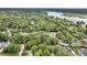 An aerial image displays a lush neighborhood with easy access to a serene lake, surrounded by nature's beauty at 31 Monte Sano Dr, Hanahan, SC 29410