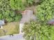 Aerial view of the home and yard surrounded by mature trees at 31 Monte Sano Dr, Hanahan, SC 29410