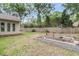 View of the backyard, featuring a garden and new fence, providing privacy and space for outdoor enjoyment at 31 Monte Sano Dr, Hanahan, SC 29410
