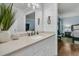 Modern bathroom with shiplap walls, a vanity with counterspace, and a view to the bedroom at 31 Monte Sano Dr, Hanahan, SC 29410