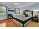 Tranquil bedroom featuring hardwood floors, a spacious bed, accent pillows, and serene decor at 31 Monte Sano Dr, Hanahan, SC 29410
