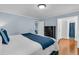 Airy bedroom with a comfortable bed, dark-wood furniture, and easy access to the bathroom at 31 Monte Sano Dr, Hanahan, SC 29410