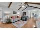 Spacious living room with hardwood floors, comfortable seating, and open access to dining area at 31 Monte Sano Dr, Hanahan, SC 29410