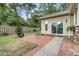 Brick patio on the back of the home with a sliding glass door at 31 Monte Sano Dr, Hanahan, SC 29410
