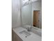 Modern bathroom features a marble countertop, decorative lighting, and updated fixtures at 3214 Pinewood Dr, Ladson, SC 29456