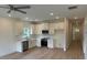 Bright kitchen features stainless appliances, white cabinetry, quartz countertops, and modern lighting at 3222 Pinewood Dr, Ladson, SC 29456