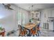 Charming dining area with a stylish light fixture and a hutch, perfect for gatherings at 3230 Landing Pkwy, North Charleston, SC 29420