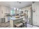 Modern kitchen with stainless steel appliances, granite countertops, and a cozy island at 3230 Landing Pkwy, North Charleston, SC 29420
