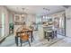 Bright kitchen with a center island, stainless steel appliances, and adjacent dining area at 3230 Landing Pkwy, North Charleston, SC 29420