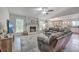 Open concept living room featuring a fireplace, and seamless flow into the kitchen at 3230 Landing Pkwy, North Charleston, SC 29420