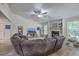 Spacious living room featuring a stone fireplace, vaulted ceiling, and comfortable seating at 3230 Landing Pkwy, North Charleston, SC 29420
