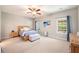 Spacious bedroom with natural lighting and a ceiling fan at 3319 Dunwick Dr, Johns Island, SC 29455