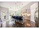 Open-concept kitchen with bar seating and stainless steel appliances at 3319 Dunwick Dr, Johns Island, SC 29455