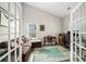 Versatile home office space with double doors, comfortable seating, and dedicated workspace for productivity at 3319 Dunwick Dr, Johns Island, SC 29455