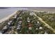 Stunning aerial view showcasing the property's location nestled among lush trees near the coast at 3320 Myrtle St, Edisto Island, SC 29438