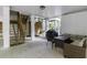Finished basement featuring a seating area, grill, shower, and stairs to upper levels at 3320 Myrtle St, Edisto Island, SC 29438