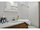 Bathroom showcasing a sink with wood cabinets, counter space, and toiletries at 3320 Myrtle St, Edisto Island, SC 29438