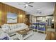 Cozy living room offering a comfortable seating arrangement and easy access to the adjacent kitchen at 3320 Myrtle St, Edisto Island, SC 29438