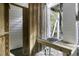 Outdoor shower features a wood paneled changing area with a sink and fixtures at 3320 Myrtle St, Edisto Island, SC 29438