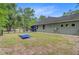 Backyard features a fenced-in area, covered porch, and is perfect for outdoor activities at 3360 Fickling Hill Rd, Johns Island, SC 29455