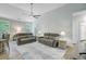 Spacious living room with a ceiling fan and lots of natural light at 3360 Fickling Hill Rd, Johns Island, SC 29455