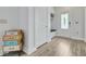 Bright mud room featuring hall tree with storage and light hardwood floors at 3360 Fickling Hill Rd, Johns Island, SC 29455
