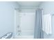 Bright bathroom featuring a shower and tub combination, complete with modern fixtures and a shower curtain at 3941 Bessemer Rd, Mount Pleasant, SC 29466