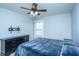 Well-lit bedroom offering ceiling fan, and dark wood dresser for efficient storage options at 3941 Bessemer Rd, Mount Pleasant, SC 29466