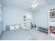 Cozy bedroom showcasing natural light, modern fixtures, and a view of the outdoors at 3941 Bessemer Rd, Mount Pleasant, SC 29466