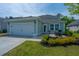 Well-maintained home with a two-car garage, cozy patio, and beautifully landscaped yard at 3941 Bessemer Rd, Mount Pleasant, SC 29466